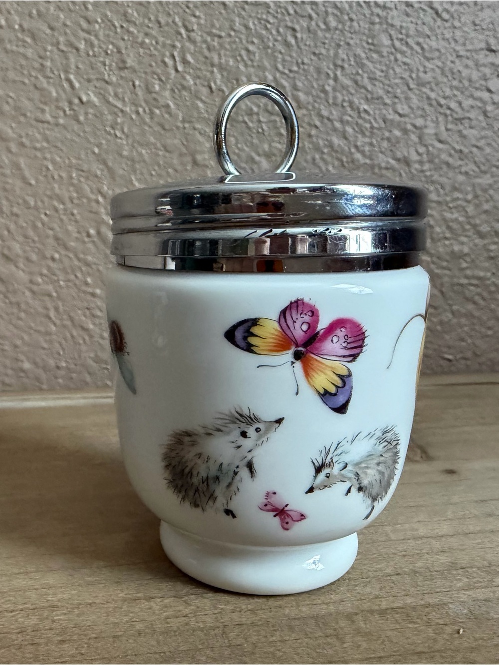 Vintage Porcelain Cup with Colorful Butterfly & Hedgehog Motifs